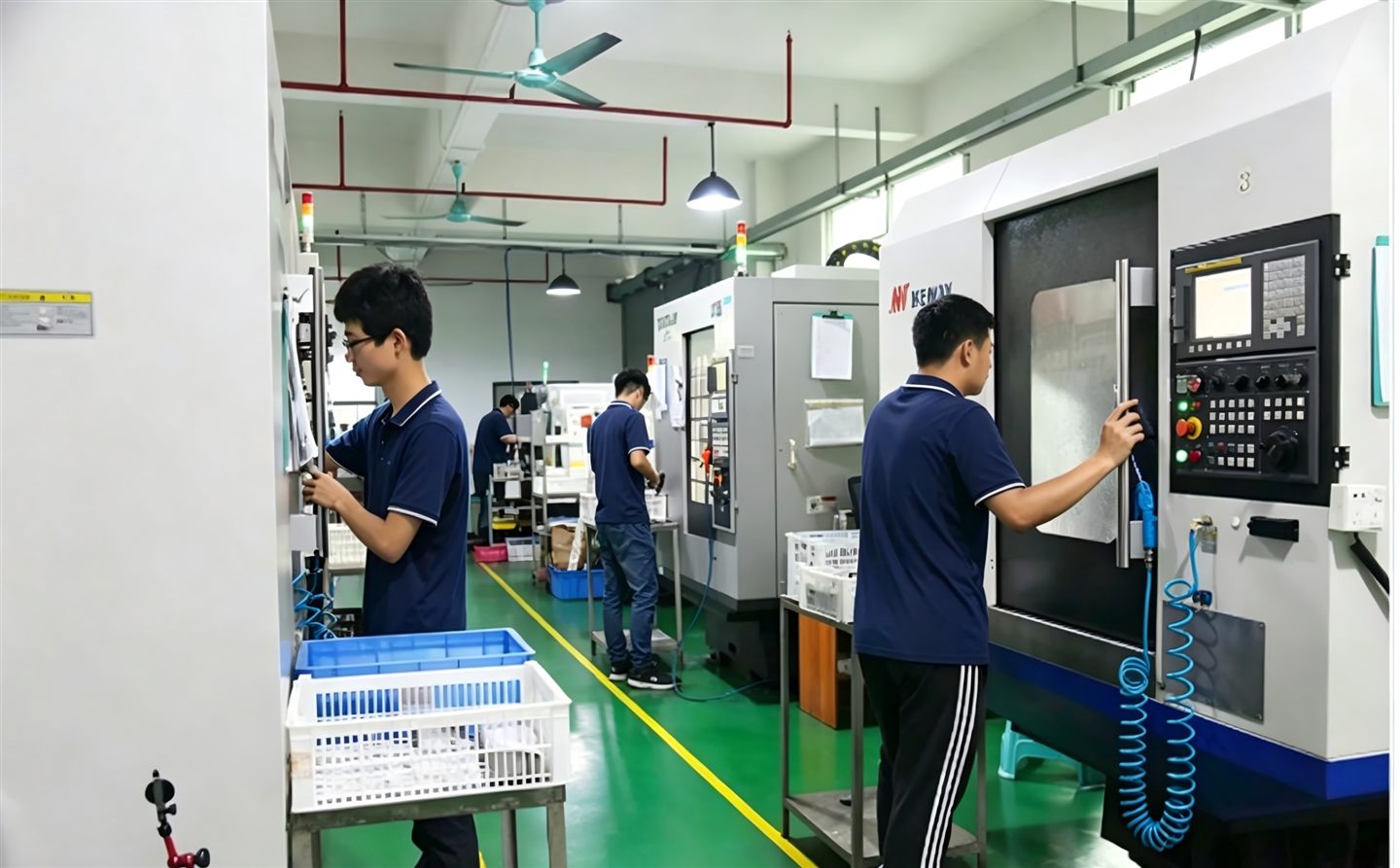 Operators working at CNC machines in the GPT Precision workshop
